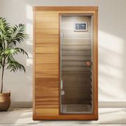 Red cedar Mini one person far infrared glass door on the right of the indoor sauna room