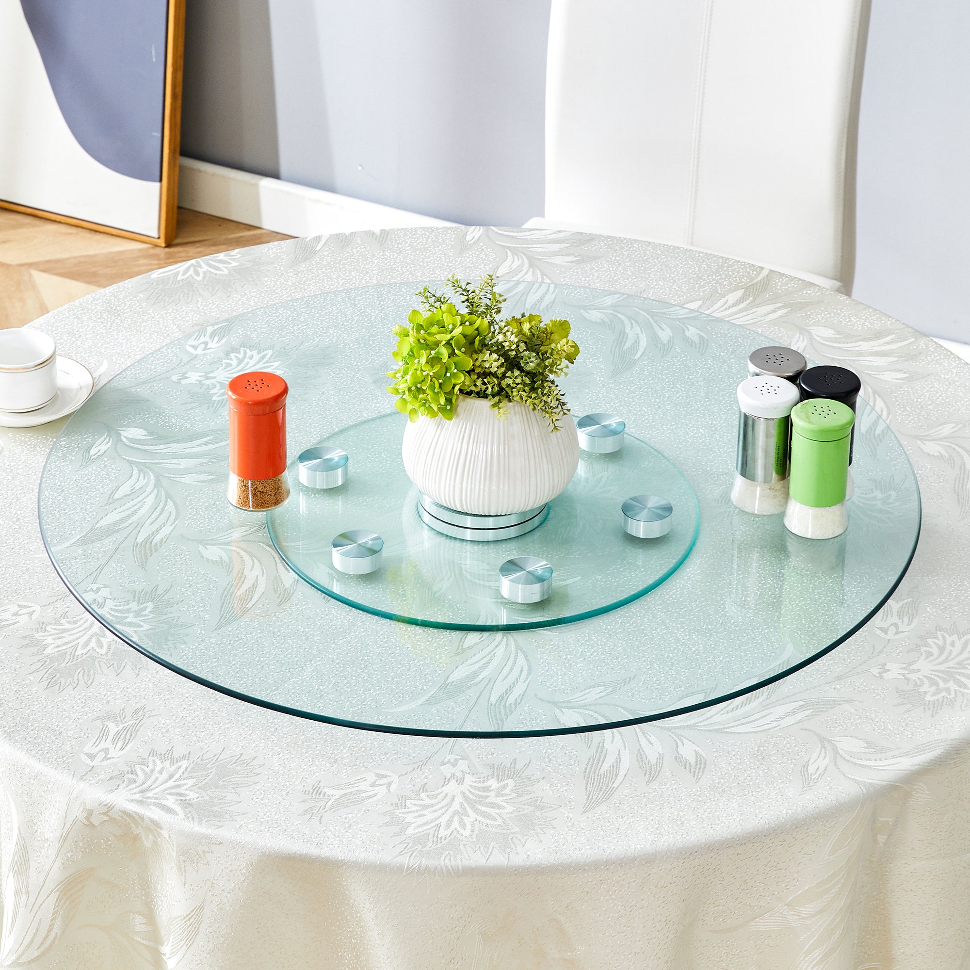 Double layer rotatable round glass.The rotatable design makes it more convenient to retrieve and place items.The upper glass has a diameter of 30.3 inches, while the lower glass15 inches.