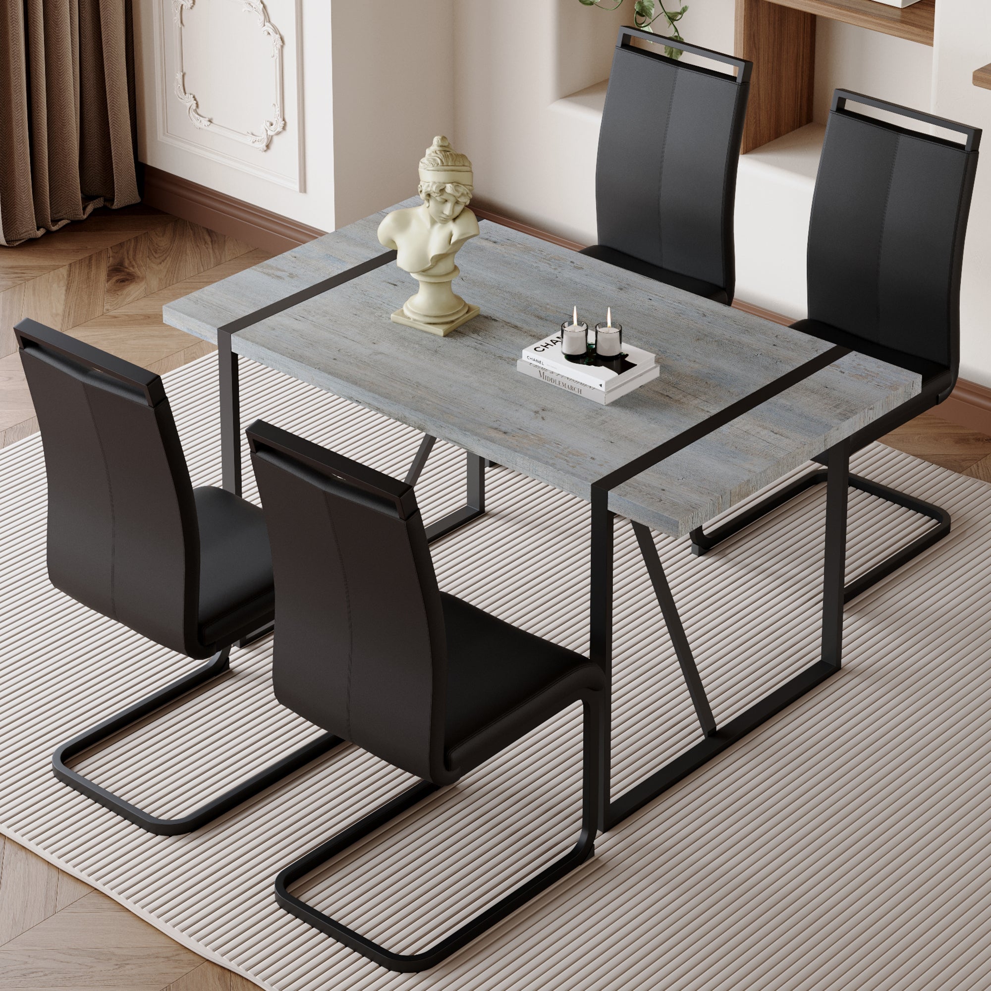 Table and chair set. Modern minimalist grey marble textured MDF dining table with metal frame.Paired with 4 black PU chairs with Black Featuring arched black legs.