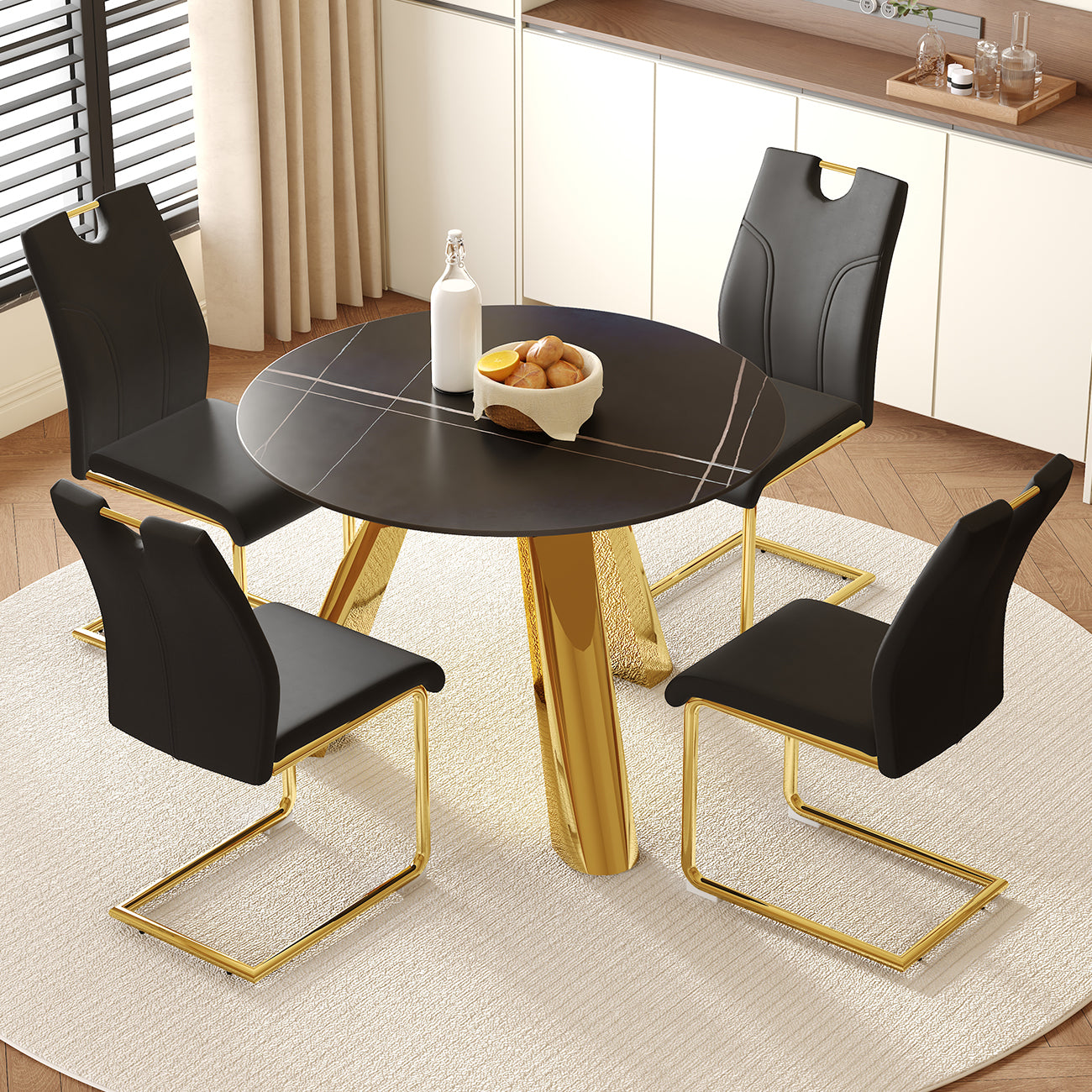 Table and chair set.A 42-inch stainless steel leg round table.Paired with 4 Uniquely designed Black Dining Chairs With Golden Metal Leg.Sintered Stone Tabletop,Golden Stainless Steels Table Legs.