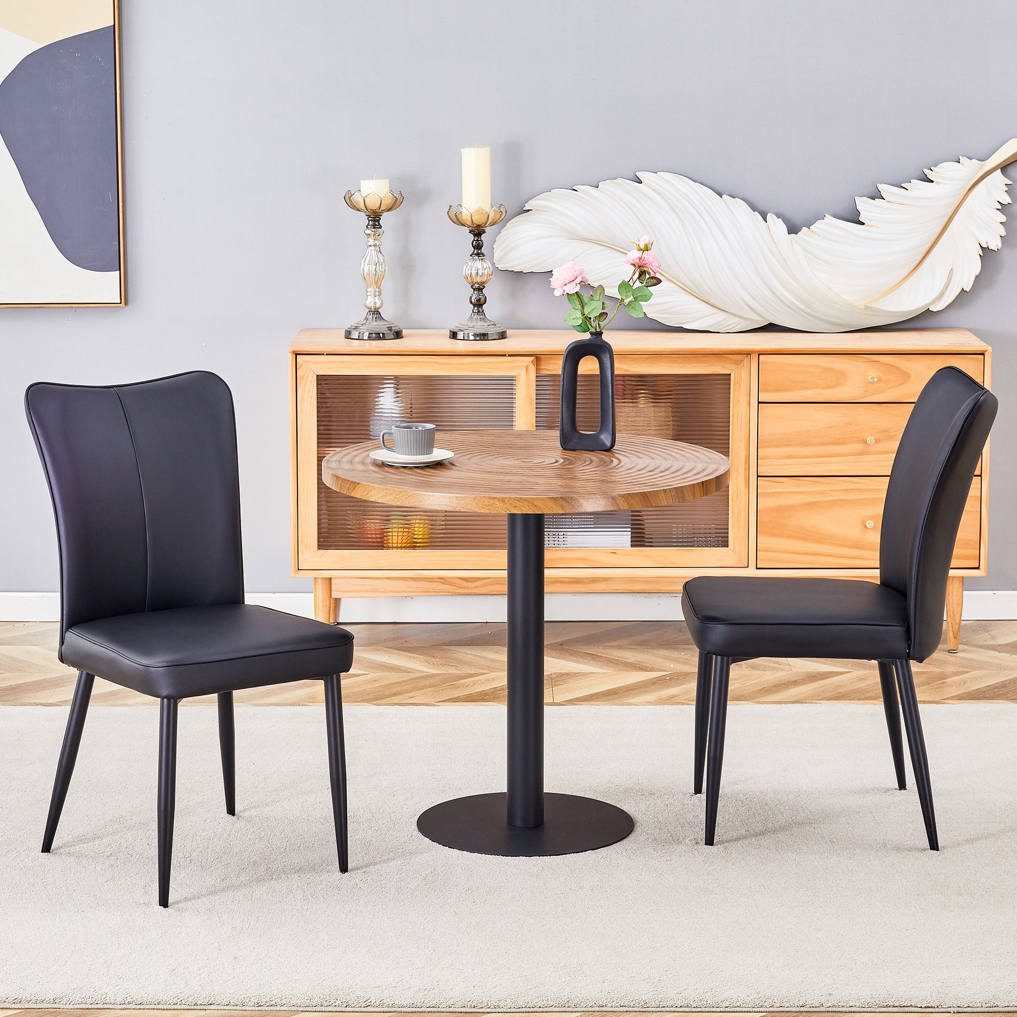 Table and chair set.31.5 Inch Dark Wood Grain Round Dining Table - Suction Molding Annular Texture.Paired with 2 Black PU chairs with a vertical stripe design on the backrest and black metal legs.