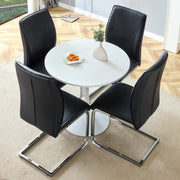 Table and chair set.Hourglass-Shaped Stable Small Round Table -31.9' * 31.9' With 4 Soft and Comfortable Black PU Chair With Arched Metal Silver Leg.Create Your Exclusive Low-Key Luxury Space.
