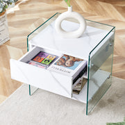 Bedside table with drawers. The board surface is MDF with white grain sticker, and both sides are transparent tempered glass. The design is simple and elegant, with excellent storage functions.