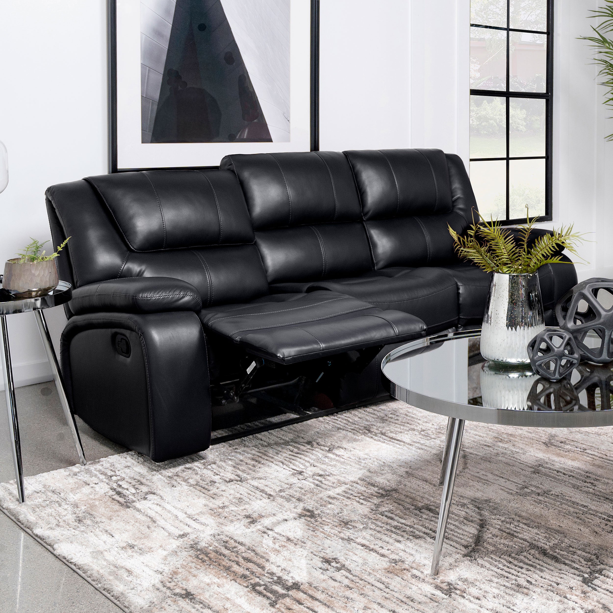Elodie Black Upholstered Motion Reclining Sofa