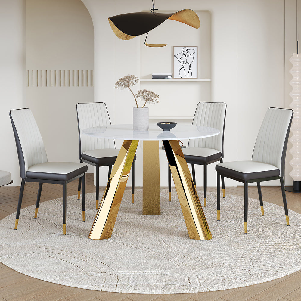 A 42-inch round dining table with cast iron base and stainless steel legs, paired with four white-gray striped dining chairs