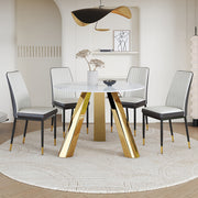 A 42-inch round dining table with cast iron base and stainless steel legs, paired with four white-gray striped dining chairs
