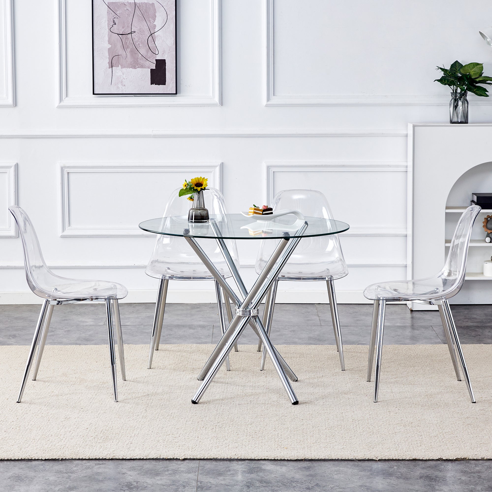 Table and chair set.36.6'Round clear glass dining table with a unique shape with ring-shaped gathered silver metal legs.Paired with 4 transparent high-quality PP dining chairs with silver legs.